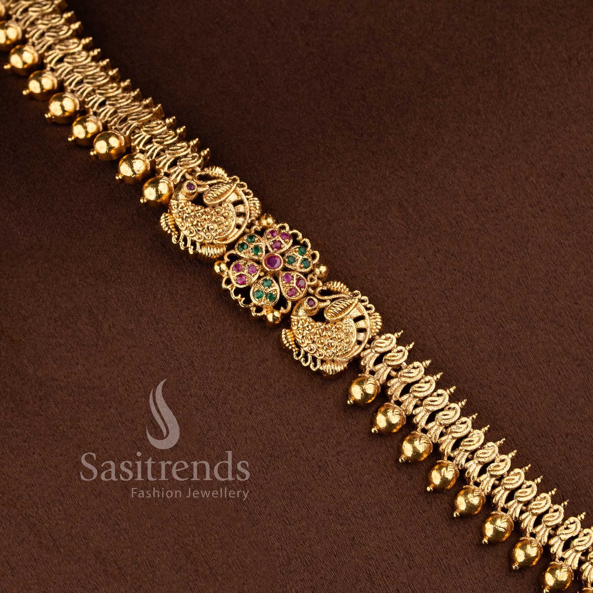 Grand Bridal Traditional Wear Matte Gold Peacock Floral Long Necklace Jewellery Set with Jhumkas for Women | Sasitrends - Image 7