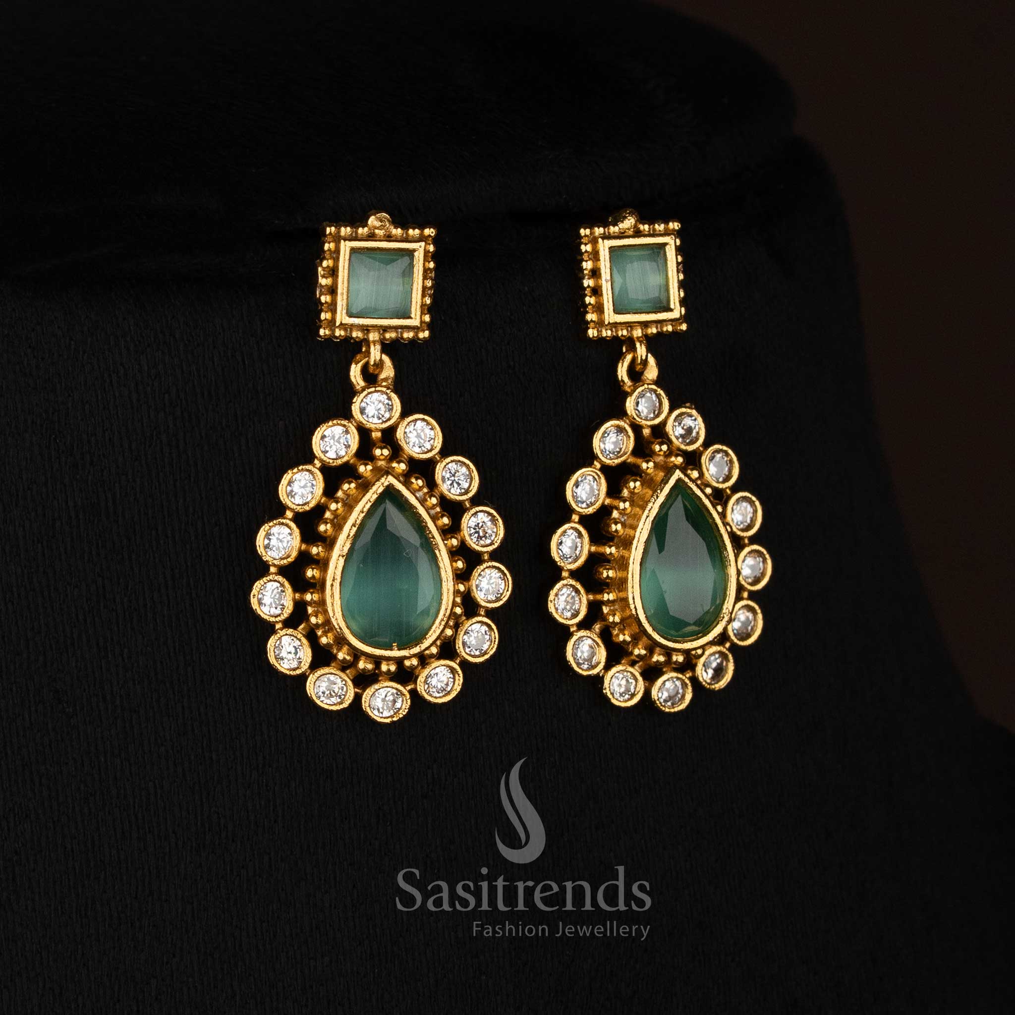 Attractive Matte Gold Plated American Diamond Teardrop Stone Square Motif Short & Long Necklace Jewellery Set for Festive Occasion Wear - Image 14
