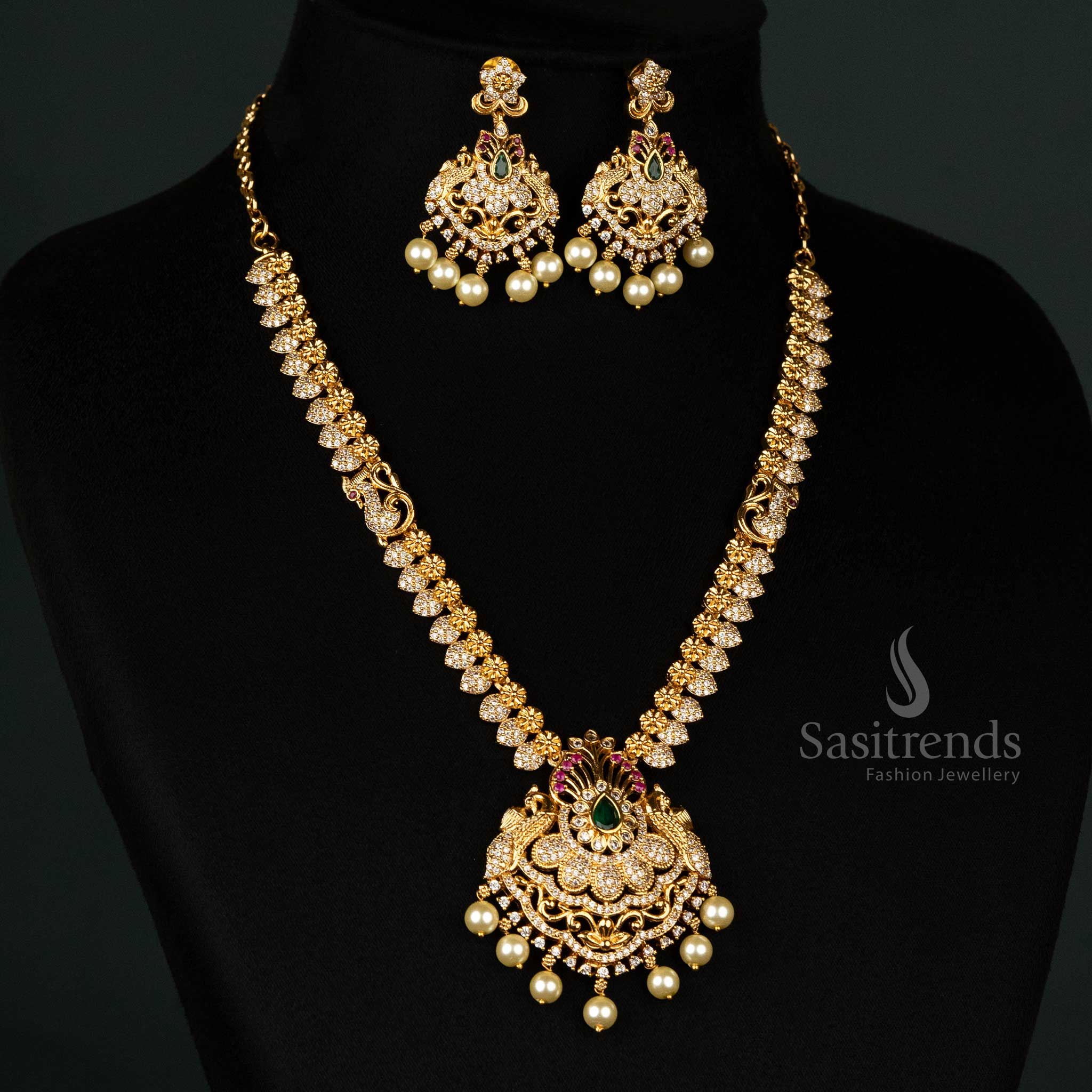 Premium Temple Matte Gold-Plated Bridal Necklace Jewellery Set with Central Peacock Motifs, Floral Design, AD, and Hanging Pearls - Sasitrends