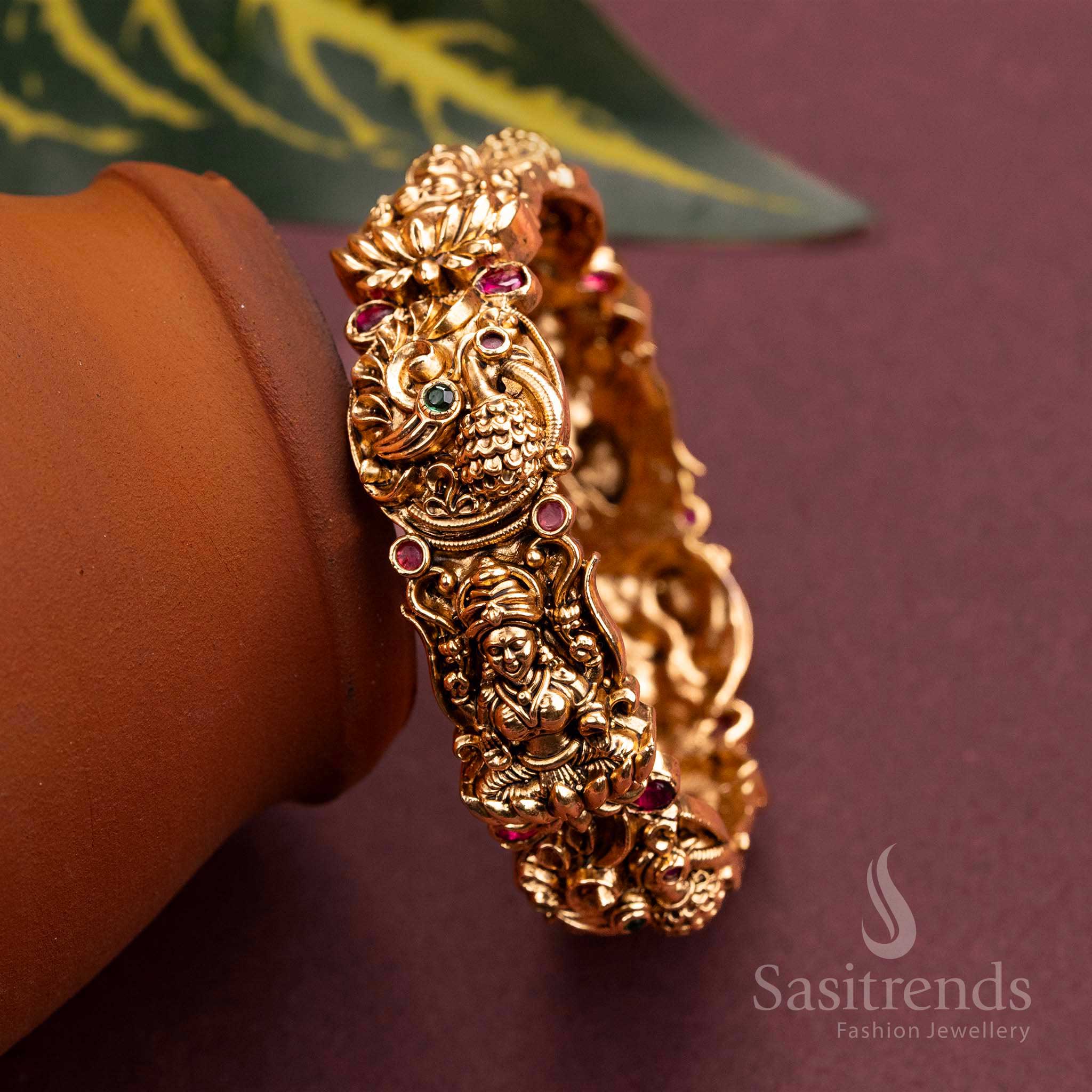 Temple Matte Gold Grand Bridal Lakshmi and Peacock Motifs Kada Bangle - Temple Gold Tone with Ruby-Green American Diamond Stones - Image 2