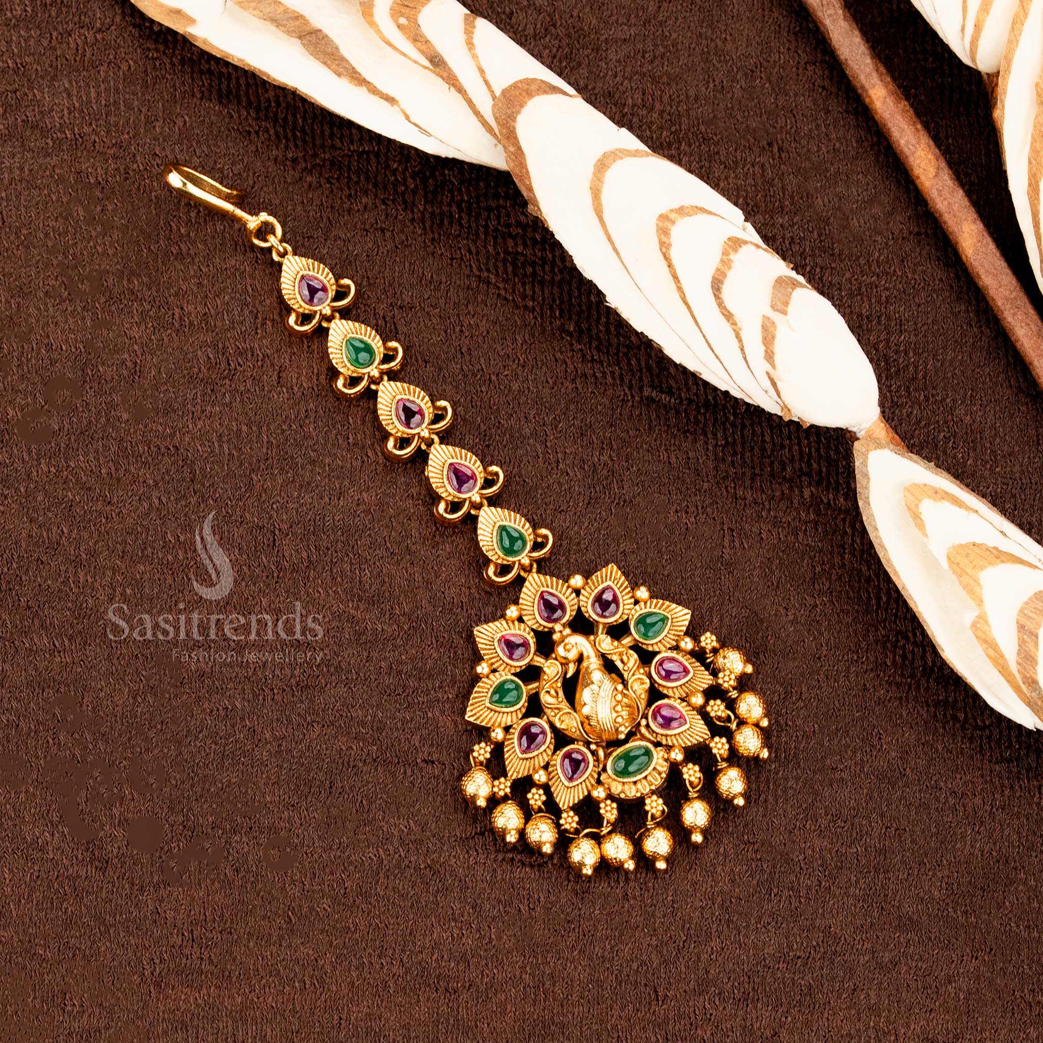 Wonderful Collection Of Premium Temple Matte Gold Plated Lakshmi Peacock Mango Floral Tikka Collection with AD Stones and Hanging Balls for Bridal and Traditional Wear - Sasitrends - Image 14
