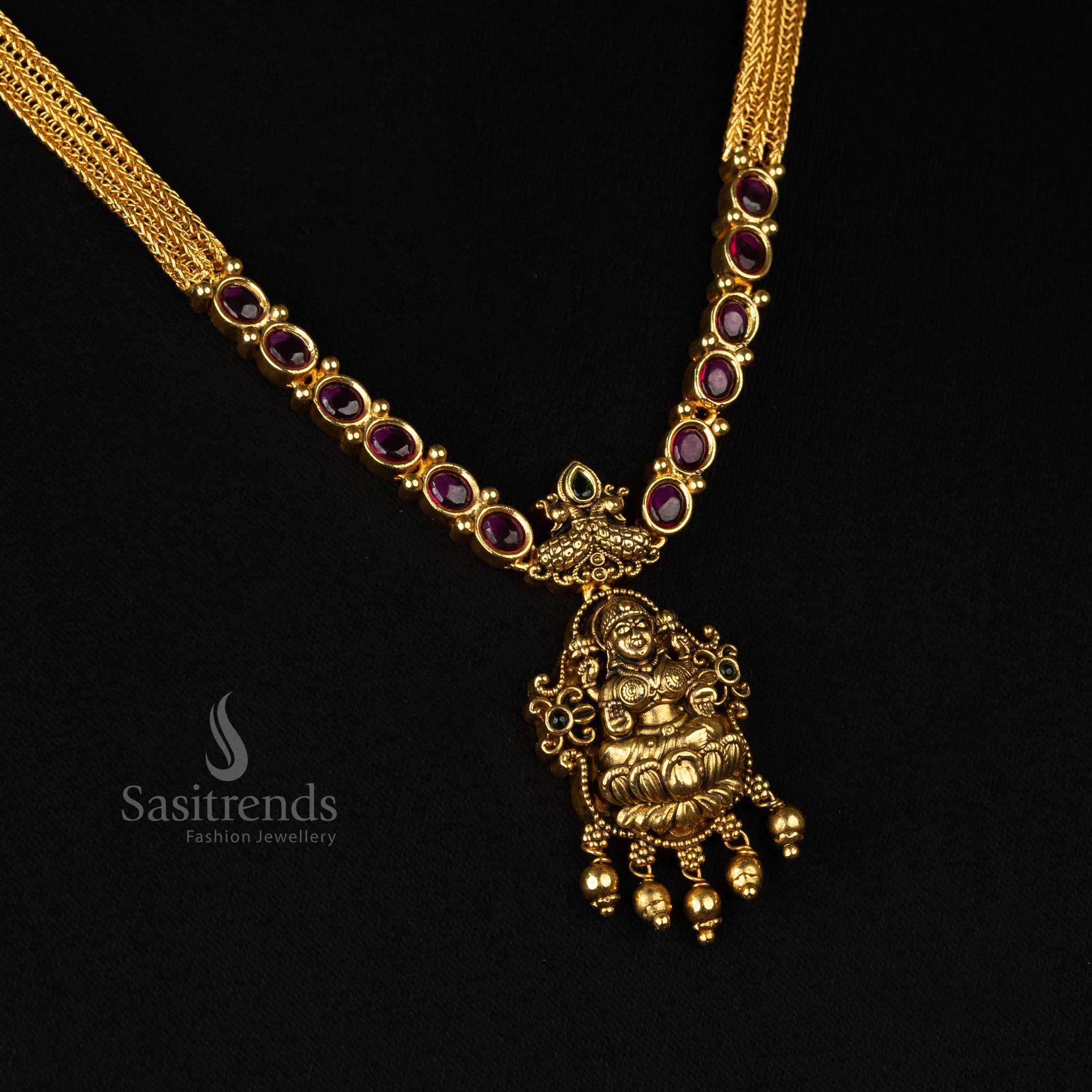 Divine Matte Gold Plated Temple Necklace Jewellery Set with Goddess Lakshmi Pendant, Dual Peacock Design & Golden Beads - Sasitrends - Image 4