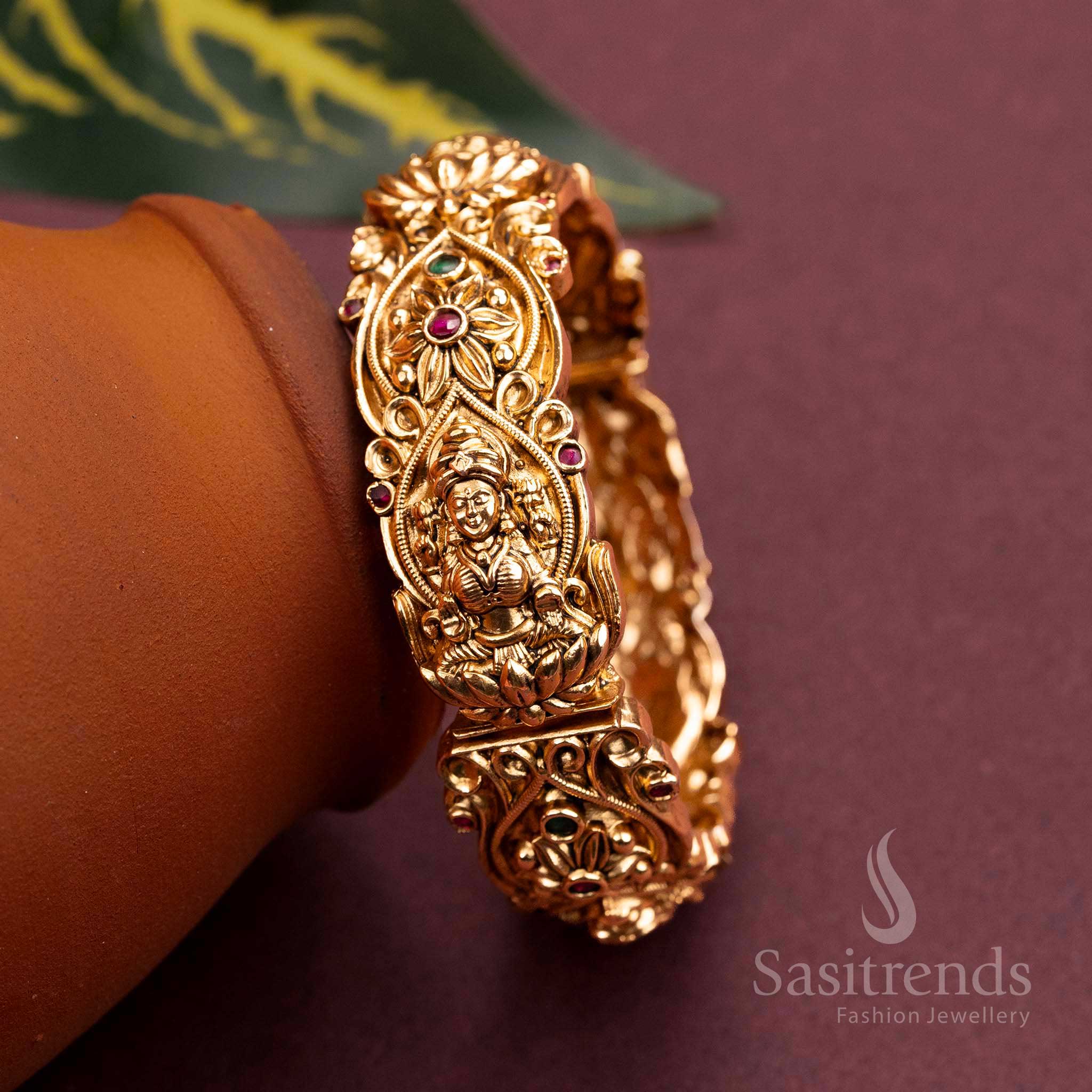 Latest Temple Matte Gold Plated Lakshmi Kada Bangle with Ruby-Green American Diamond Stones for Women | Sasitrends