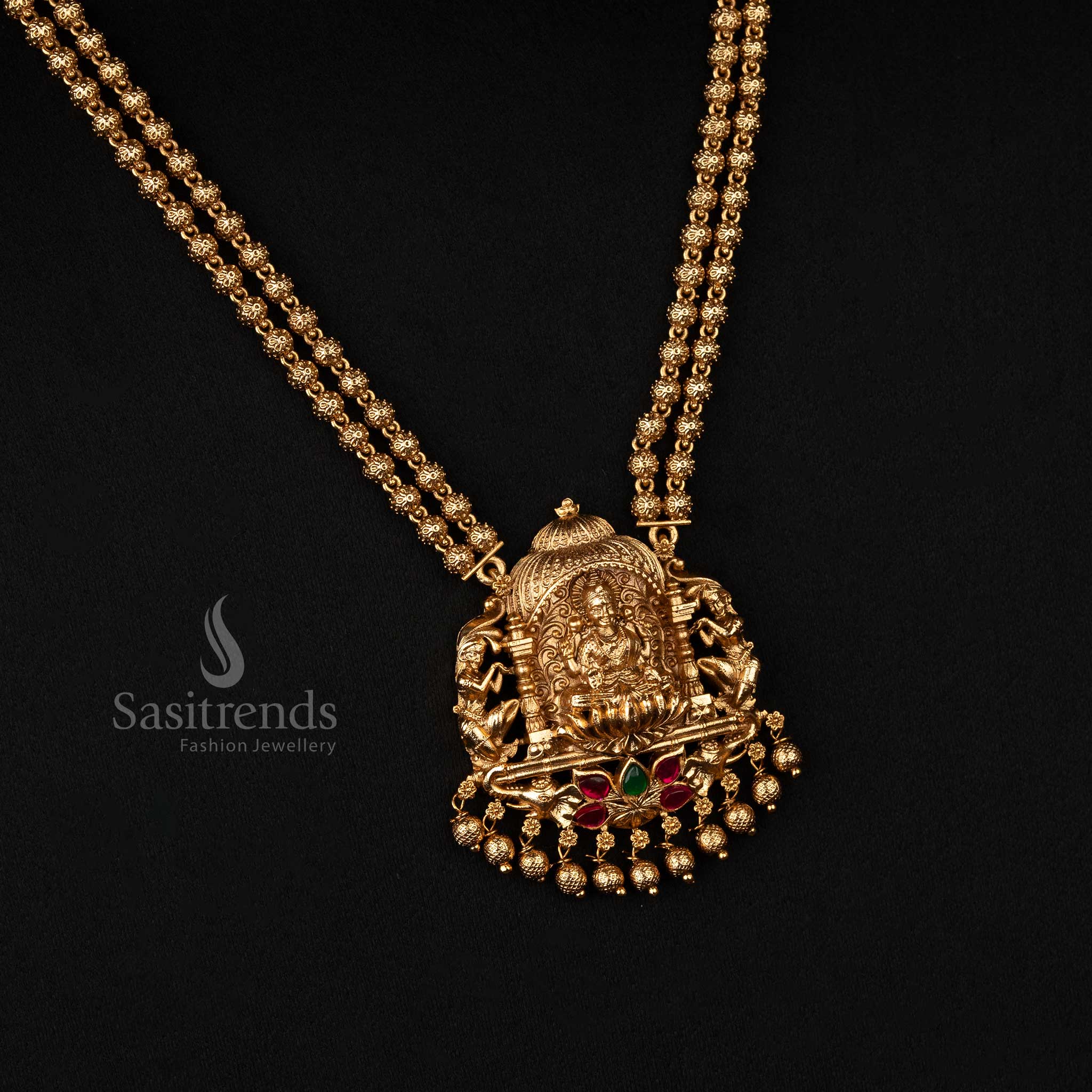 Stunning Premium Temple Matte Gold Plated Lakshmi Long Necklace Jewellery Set with Dual-Layered Floral Beaded Chain, Intricate Lakshmi Pendant, and Matching Stud - Sasitrends - Image 3