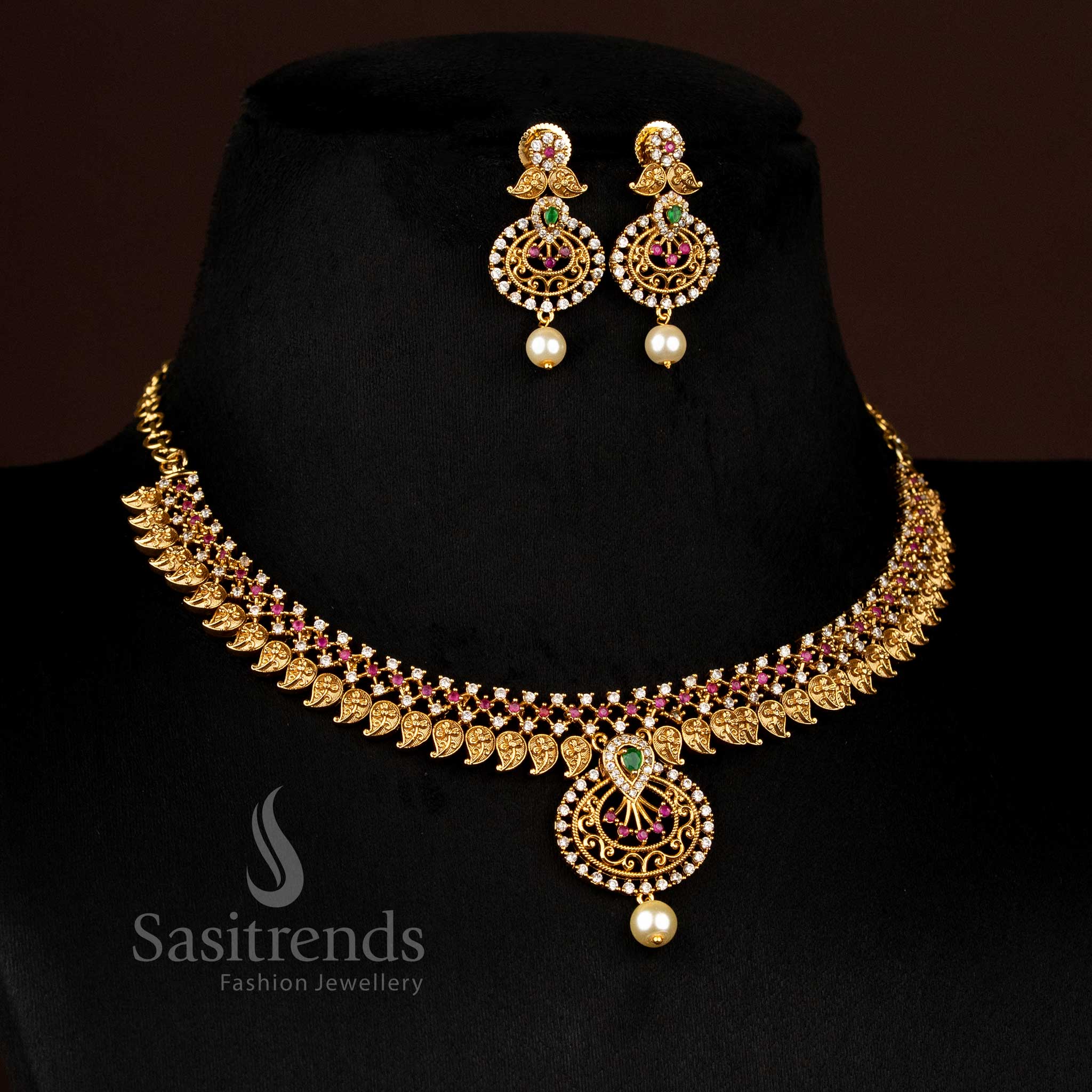 Premium Matte Gold Plated Paisley Motif Jewellery Linked AD Stones with Circular Pendant and Pearl Choker Necklace Set