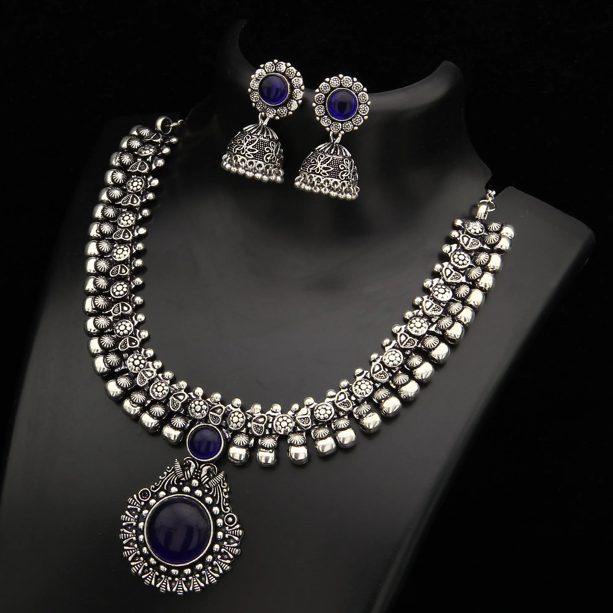 Haarini Oxidised Silver Stones Peacock Pendant and Floral Jhumka Necklace Jewellery Set