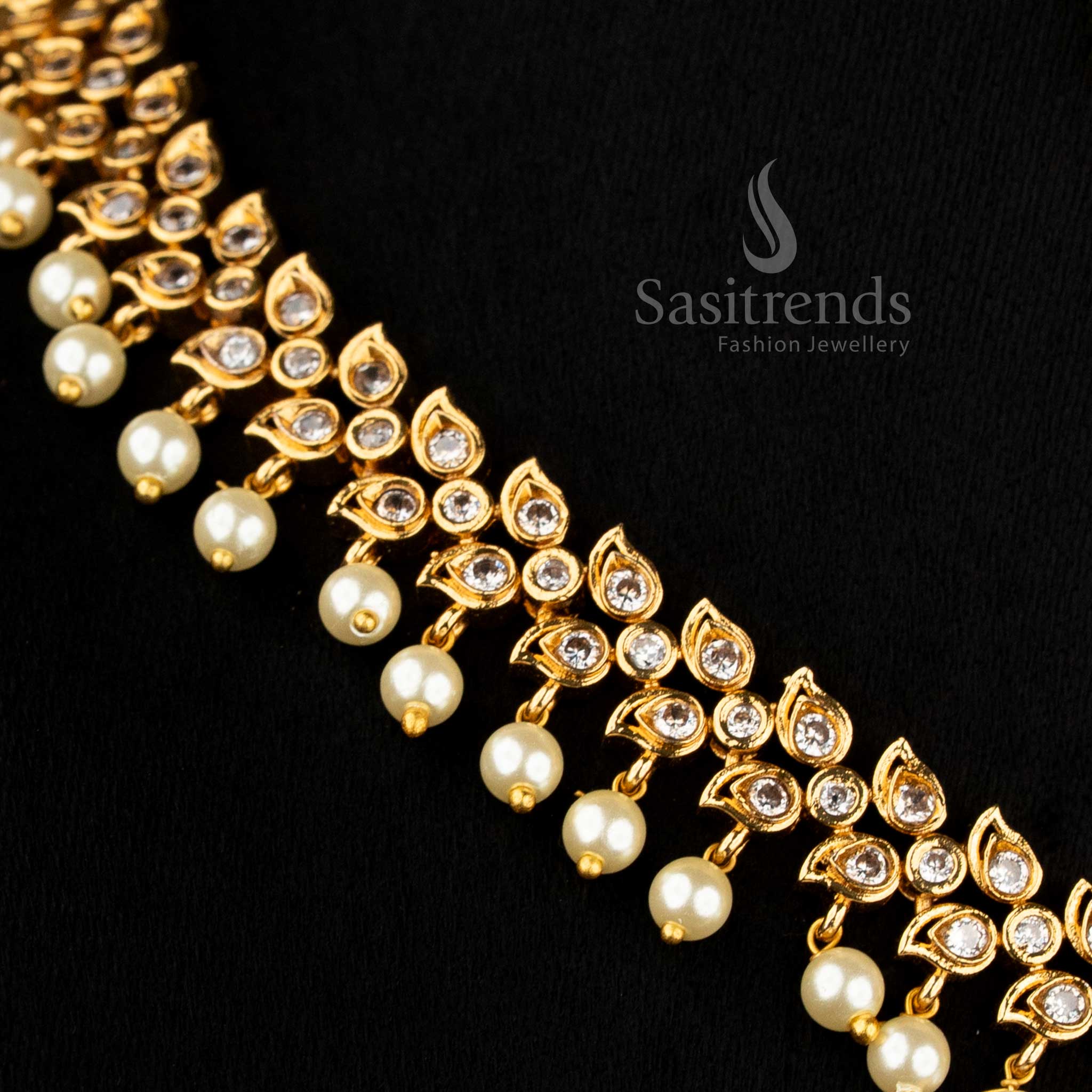 Luxurious Matte Gold Plated American Diamond Oval Linked Necklace Set with Cascading Paisley Stones and Pearls – Sasitrends - Image 4