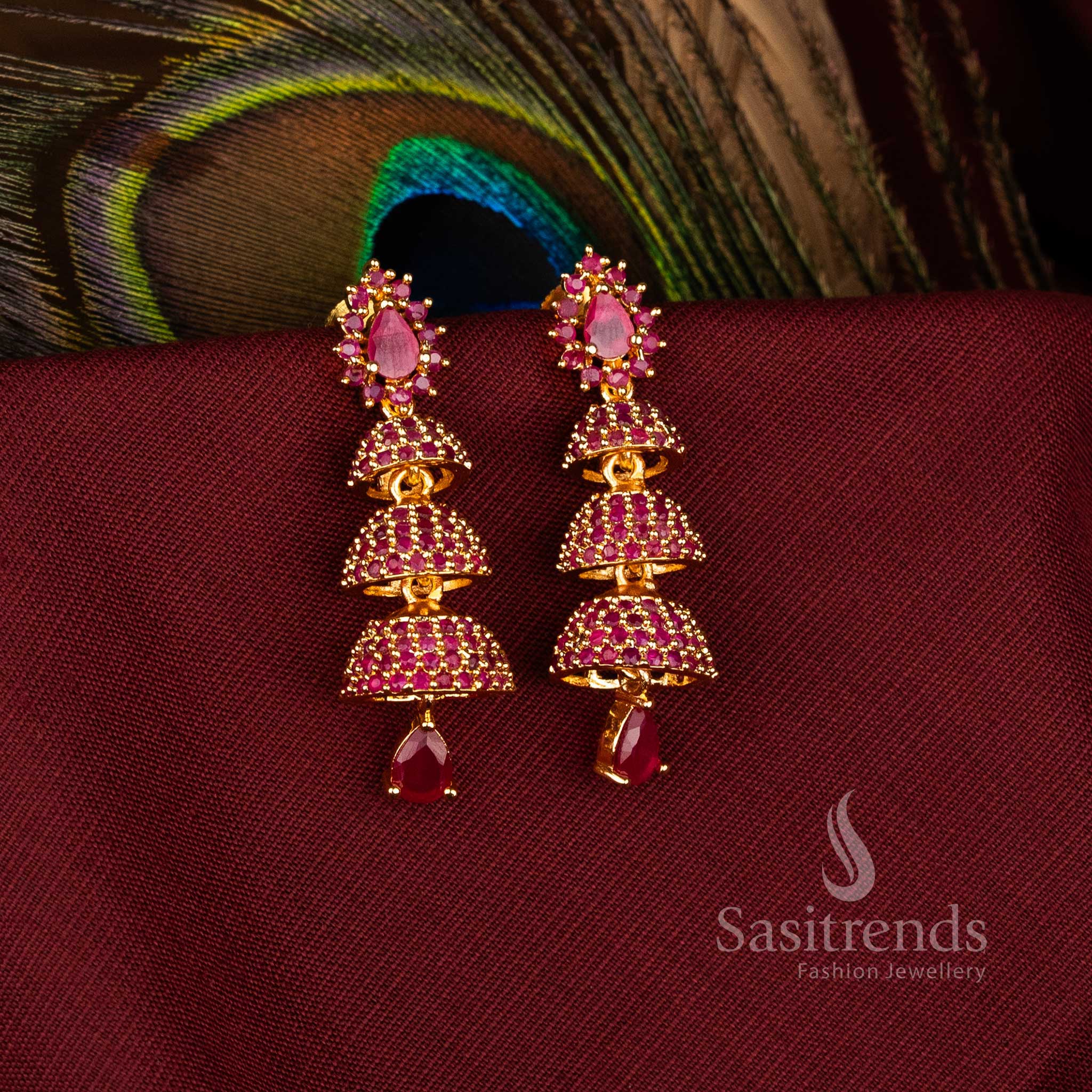 Majestic American Diamond Gold Plated Brass Triple Layer Bell Pattern Jhumka Earrings for FestiveWear - Image 3