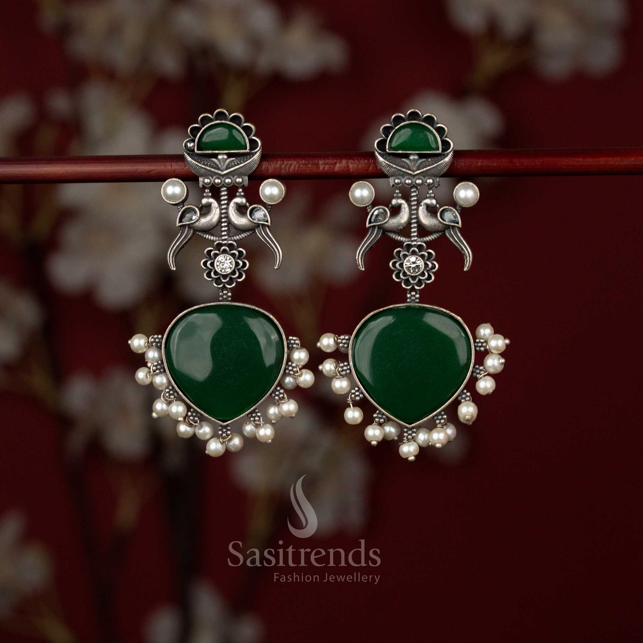 Oxidised German Silver Dual Peacock Motifs Heart-Shaped Earrings with Pearls for Festive Dressing - Image 3