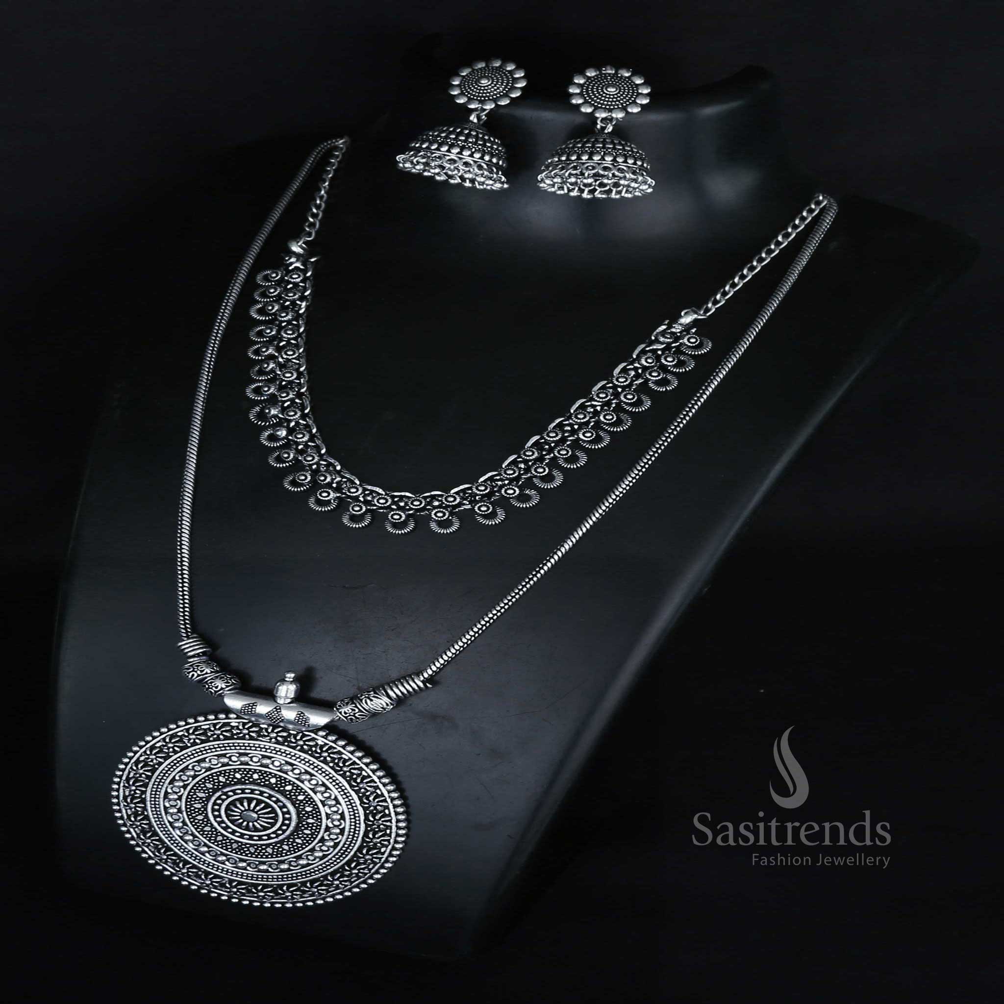 Roopasi Chakra Pendant Chain and Tanvi Oxidised Choker Necklace Jewellery Set with Floral Jhumka Earrings