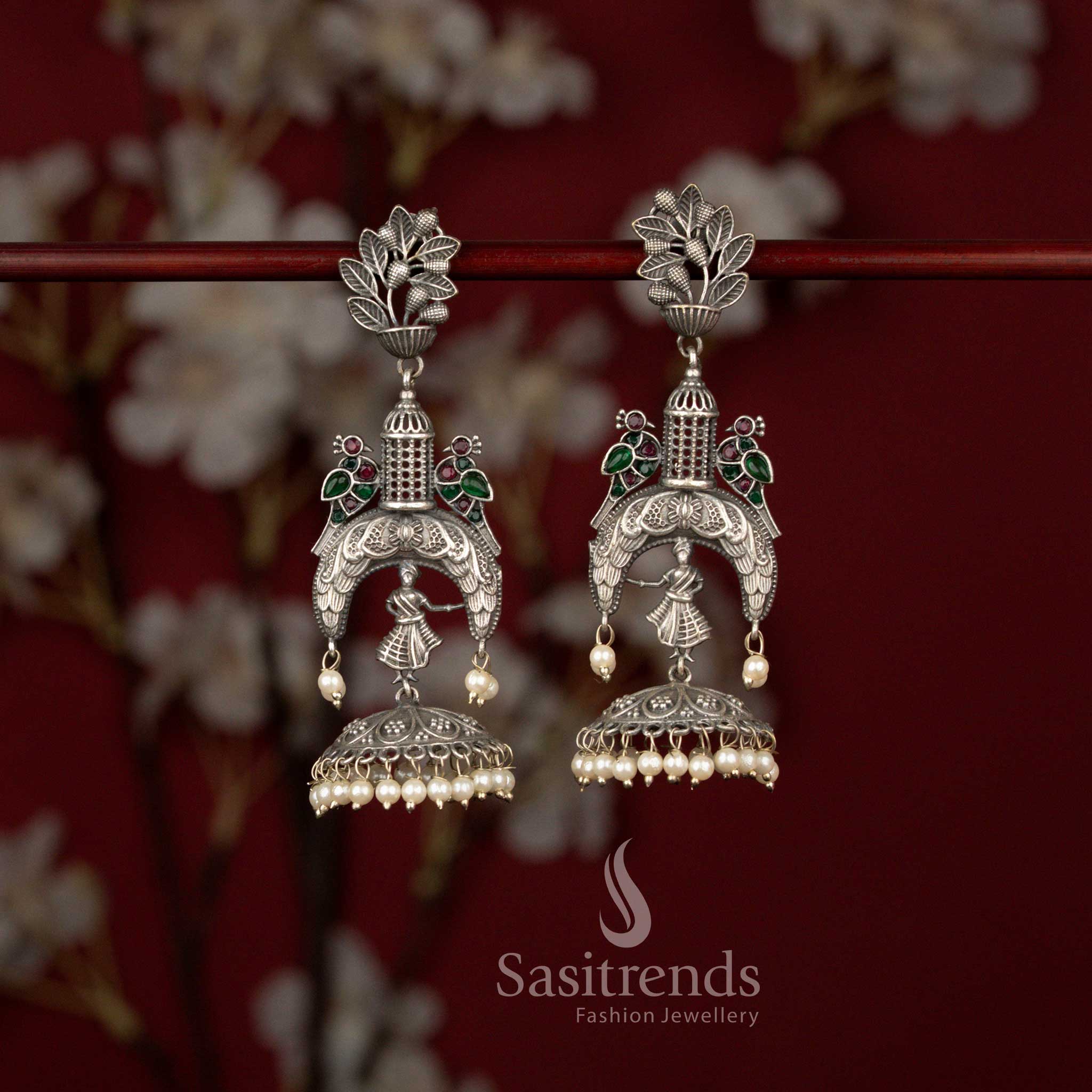 Dazzling Antique Oxidised Silver Plated Temple Style Jhumka Earrings with Sculpted Dancer Motif, Floral Top Design and Pearl Drop Detailing - Image 3
