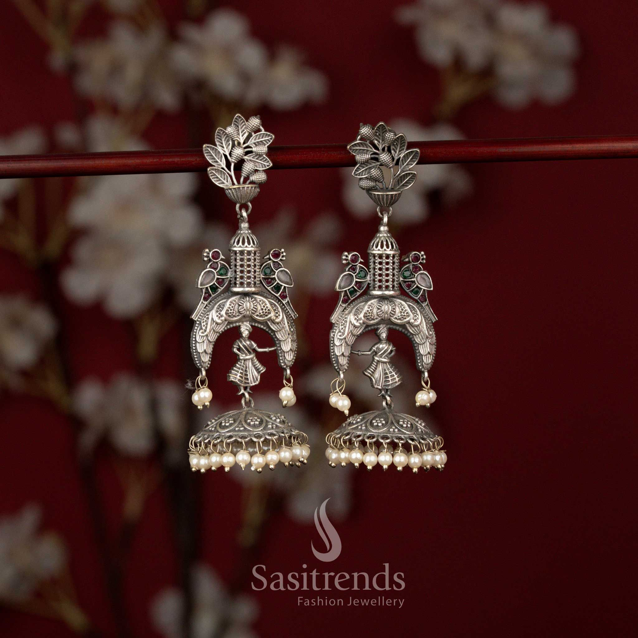 Dazzling Antique Oxidised Silver Plated Temple Style Jhumka Earrings with Sculpted Dancer Motif, Floral Top Design and Pearl Drop Detailing - Image 4