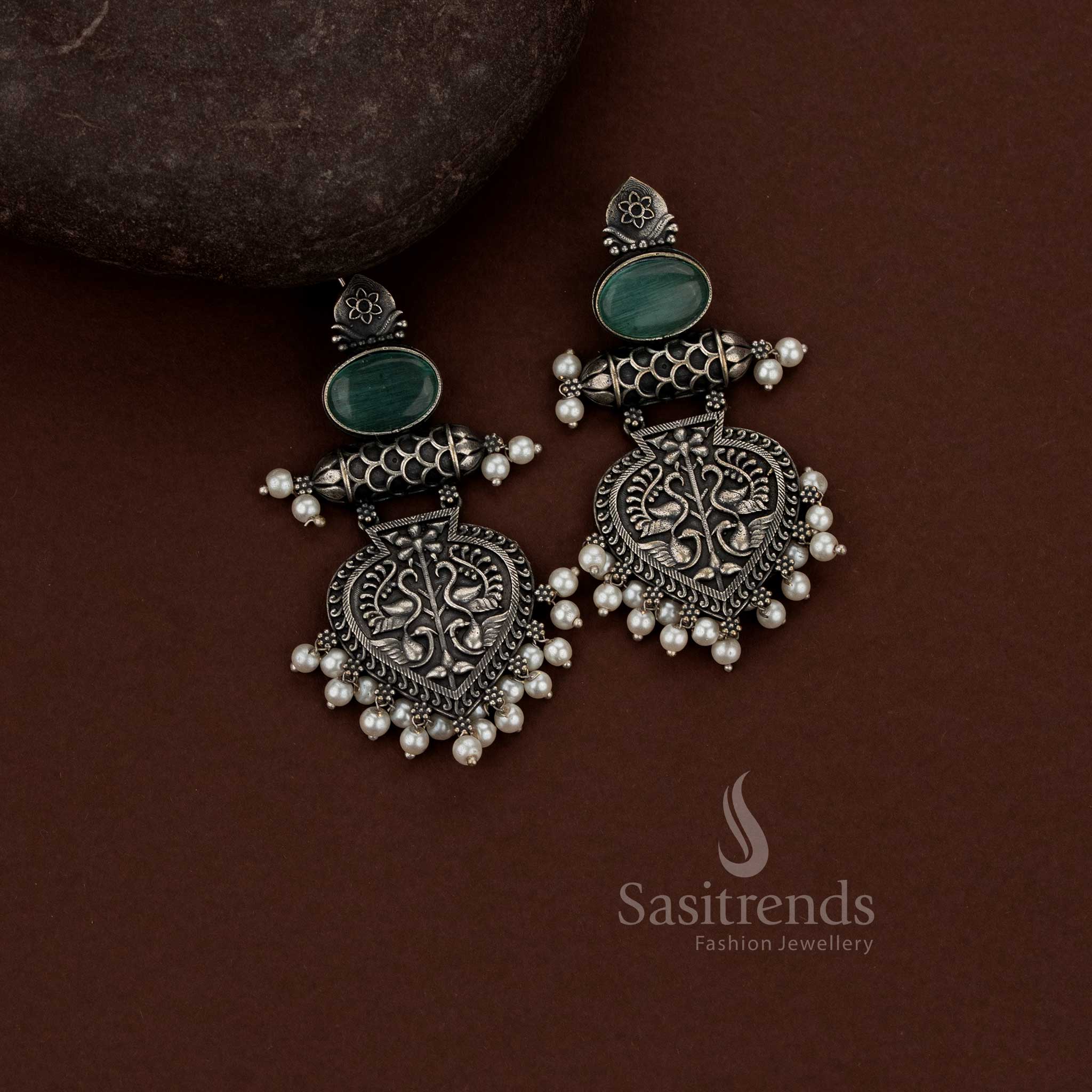 Charming Oxidised German Silver Temple-Inspired Layered Drop Earrings with Oval Stone Connector, Engraved Shield Motif and Pearl Cluster Detailing - Image 3