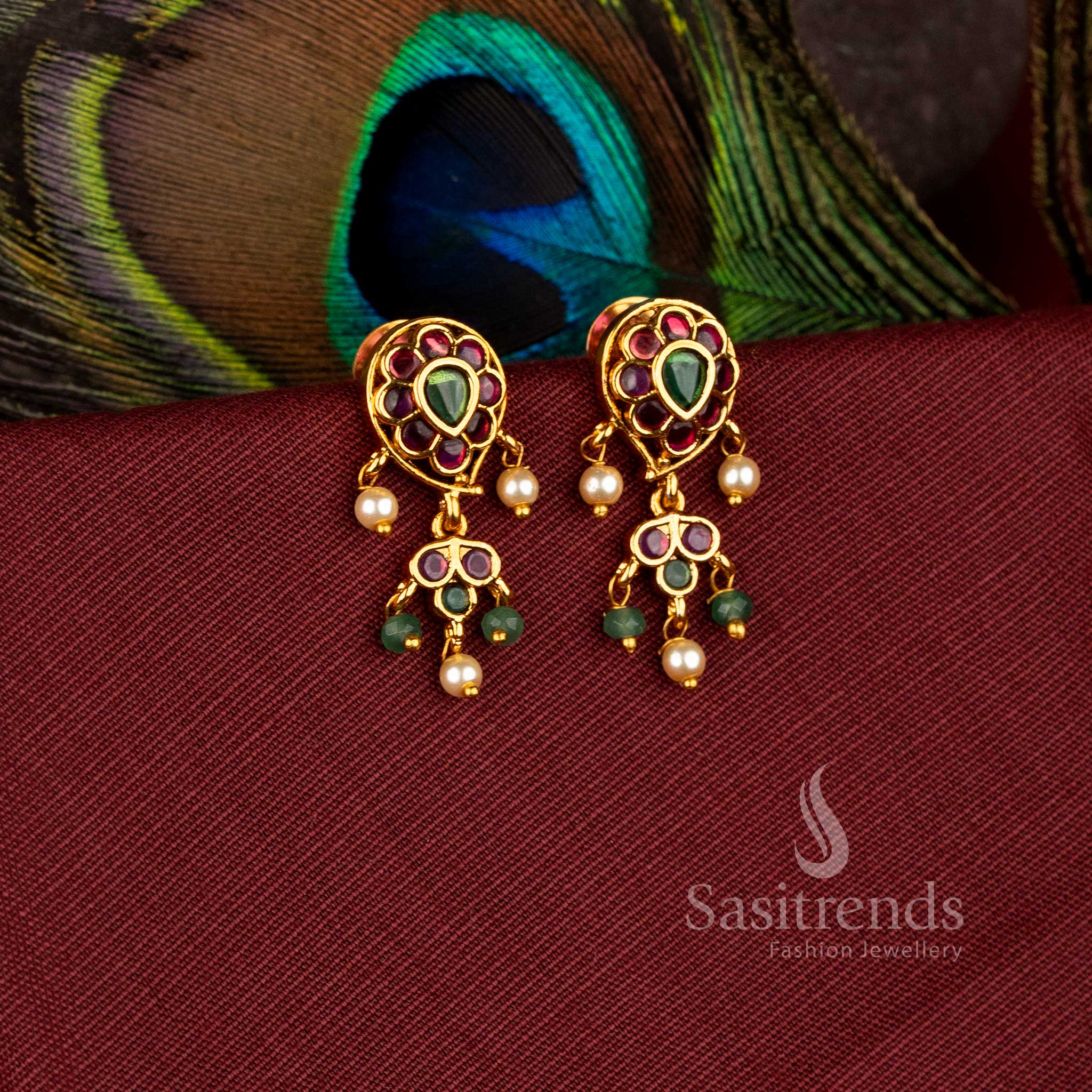 Elegant Paisley Flower AD Stone Matte Gold Plated Drop Earrings for Festive Wear - Sasitrends