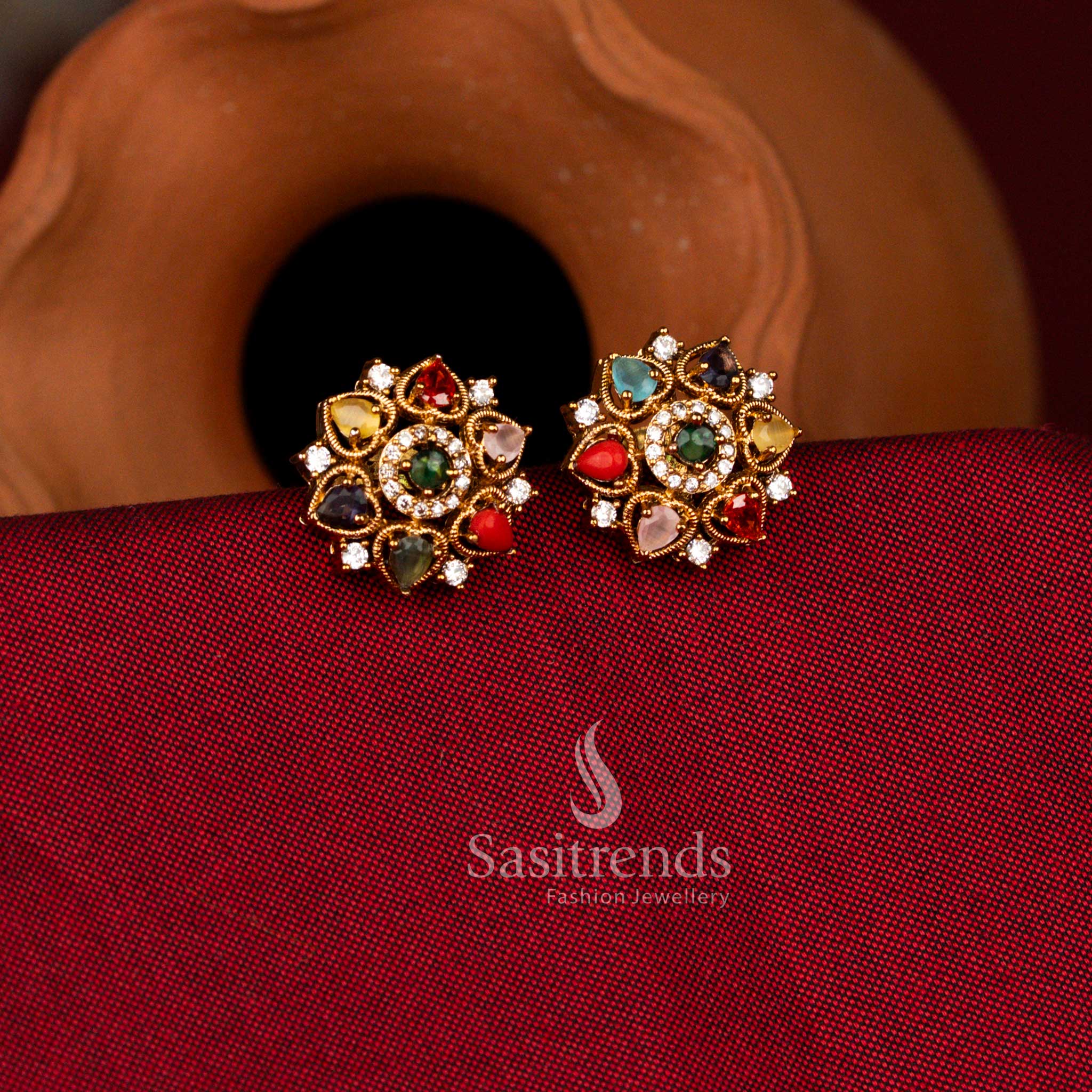 Dazzling Premium Matte Gold Plated Heart Shaped Pear and Round Stone Floral Cluster Earrings | Bridal & Festive Wear